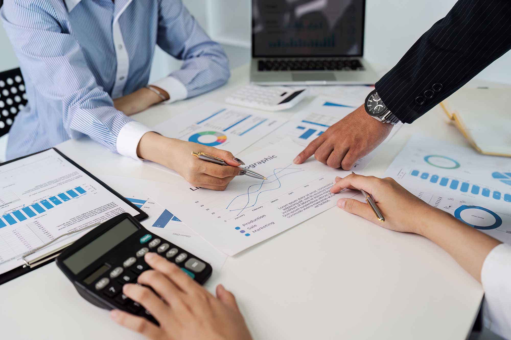 accountant-team-meeting-together-with-laptop-and-p-2023-11-27-05-04-15-utc.jpg